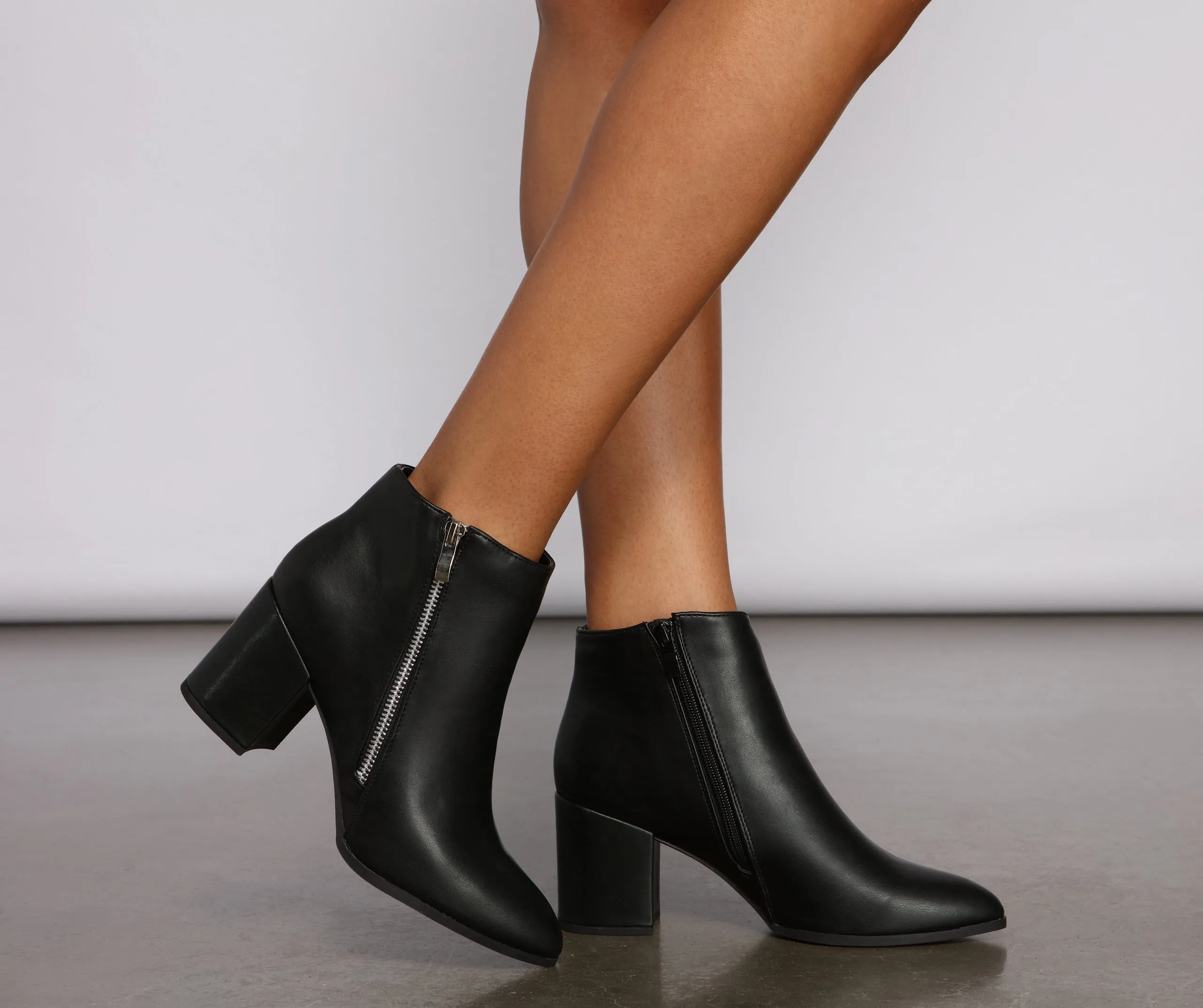 Effortless And Edgy Faux Leather Booties