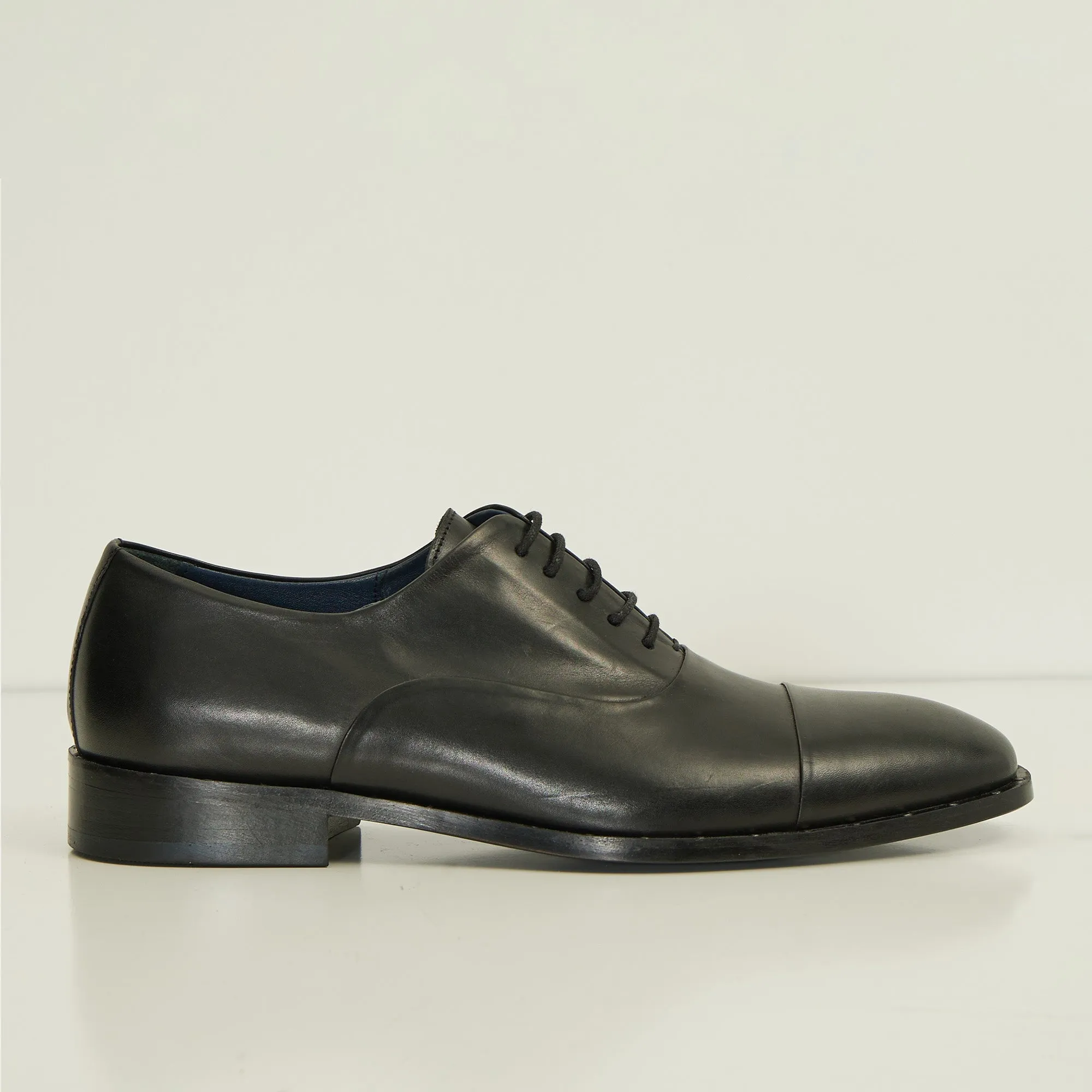 The Studded Cap Toe Oxfords Polished Leather - Black